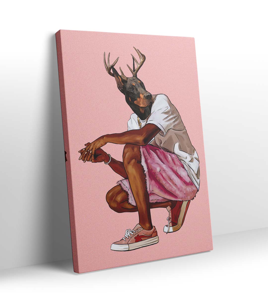 Wall art of a dog with deer antlers wearing a white shirt, pink shorts, and sneakers on a pink background.
