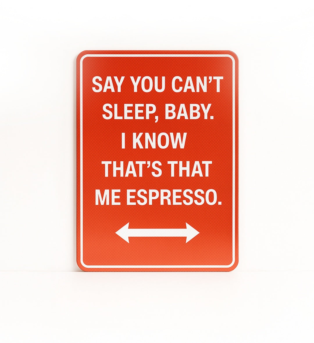 Soulful "Say You Can't Sleep Baby" lyrics printed on a street sign board.