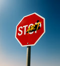 Pinterest inspired Stop sign with 'ART' spray-painted on it for adding street vibes to home walls.