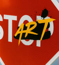 Stop sign with 'ART' in yellow and black on a red background for home decor.