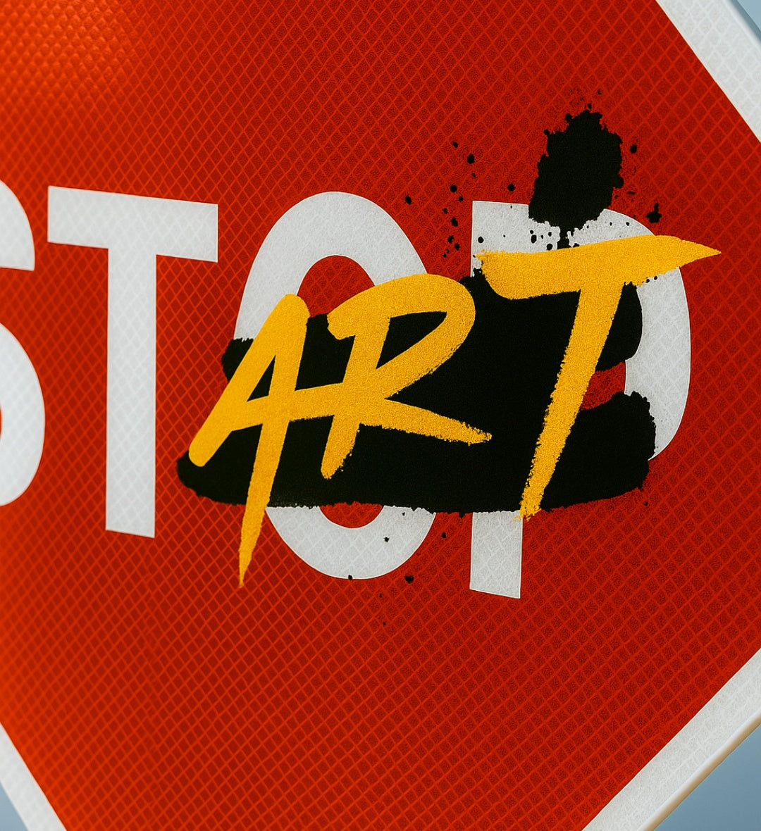 Stop sign with 'ART' in yellow and black on a red background for home decor.